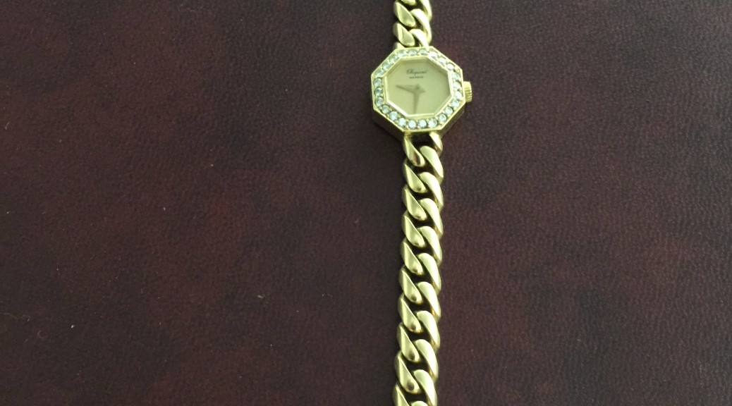 Goldene Armbanduhr Geneve Chopard mit Brillantkranz