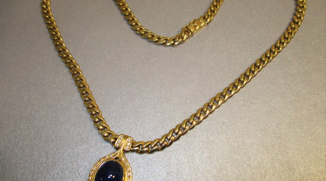 Goldene -750- Halskette mit dito Anhänger